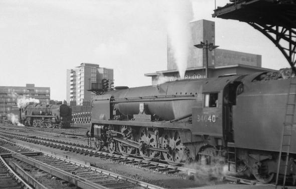 The summer of '66 and two steam engines at Waterloo station. For the record they are Merchant Navy no. 35027 'Port Line' and West Country no. 34040 Crewcerne